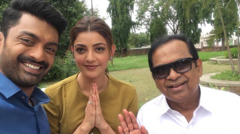 Kajal shared this photo of hers with Kalyan Ram and Brahmanandam from the sets of MLA.