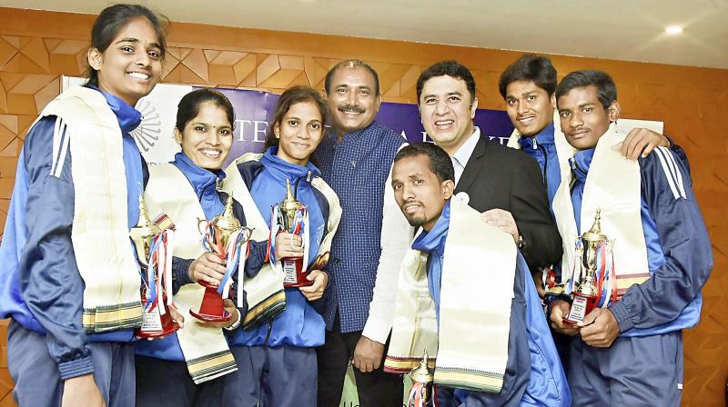 Hockey players pose with the trophies after receiving awards in the 1st Telangana Hockey Awards at a grand ceremony in Hyderabad. S. Shiva Kumar, K. Jyothi, Ranjit Chand, Kashish Fathima, B. Rama Krishna and D. Geetha were the players to be awarded at the event.