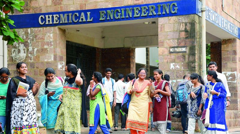 Students of Andhra University come out of their departments after attending the first day classes on the opening day at AU Campus in Visakhapatnam on Monday. (Photo: DC)