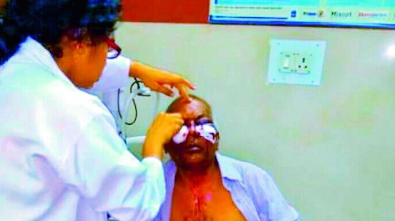 Veera Swami being treated at a hospital.