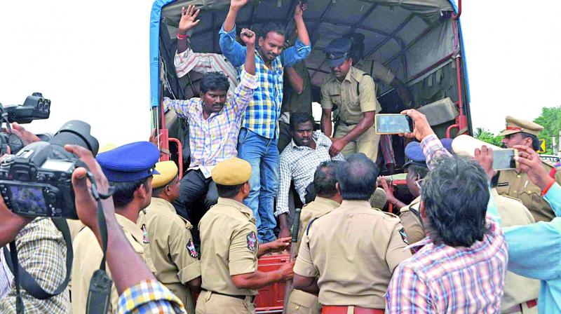 MRPS activists taken away by police while on their way to participate in Kurukshetra meeting, in front  of Acharya Nagarjuna University on Friday. (Photo: DC)