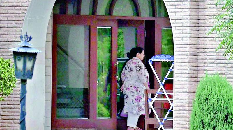 Misa Bharti outside her farmhouse in Ghitorni during a raid conducted by the Enforcement Directorate officials, in New Delhi, on Saturday. (Photo: PTI)