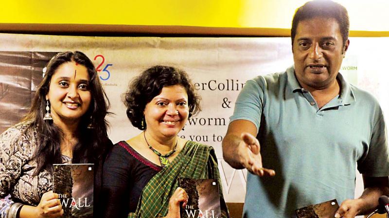 Actors Malavika and Prakash Raj with Author Sowmya Aji during the launch of the book â€œThe Wallâ€at Bookworm, Church Street, in Bengaluru on Saturday. (Photo: R. Samuel)