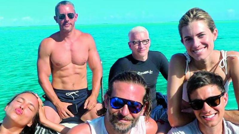 Vacation goals: Supermodel Irina Shayk and actor Bradley Cooper are on a Tahitian vacation with Anderson Cooper, Andy Cohen and others.