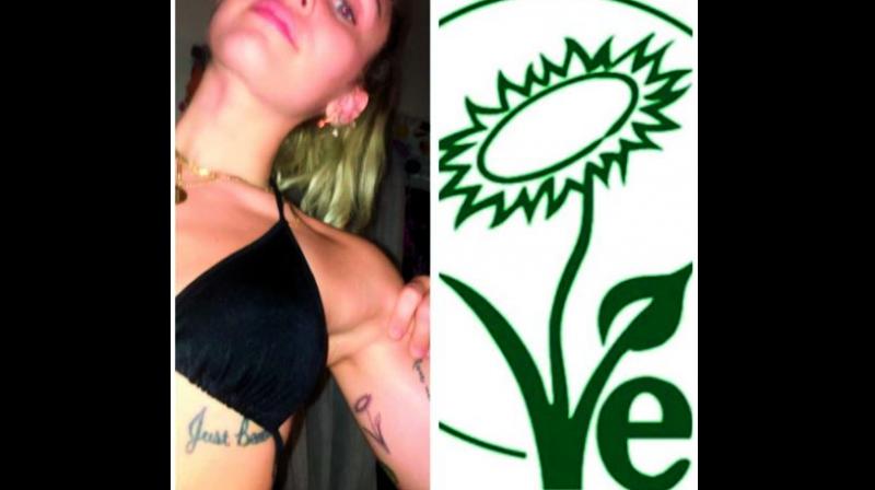 Inked: Miley Cyrus shows off her new tattoo on Instagram.
