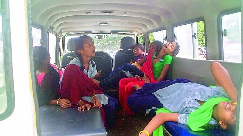 Students of KGBV who fell sick after eating breakfast being shifted to government hospital in Sirpur town for treatment in Kumrambheem, Asifabad district on Monday.  (Photo: DC)