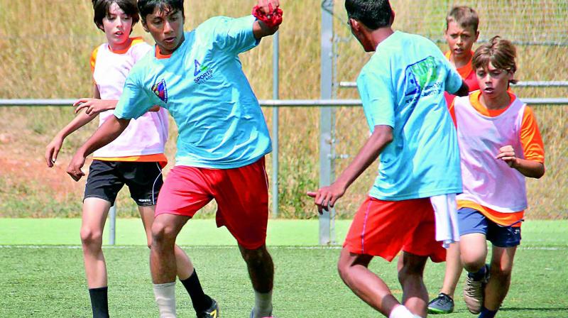 Hyderabad footballers go through the drills during a training session at the FC Matadepera in Terressa, Spain.