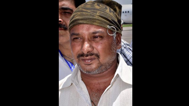 Salim, driver of the bus that was attacked by the militants in J & K, on his arrival at the airport in Surat on Tuesday. (Photo: PTI)