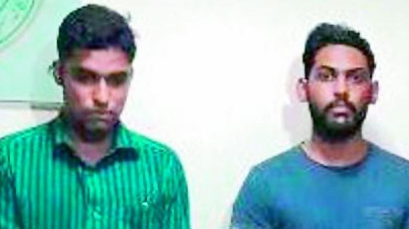 The two drug peddlers arrested by officials.