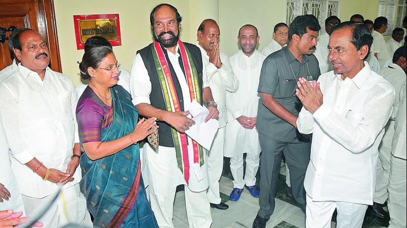 Chief Minister K. Chandrasekhar Rao greet TPCC president N. Uttam Kumar in the Assembly where the MLAs cast their votes for the Presidential election on Monday. (Photo: DC)
