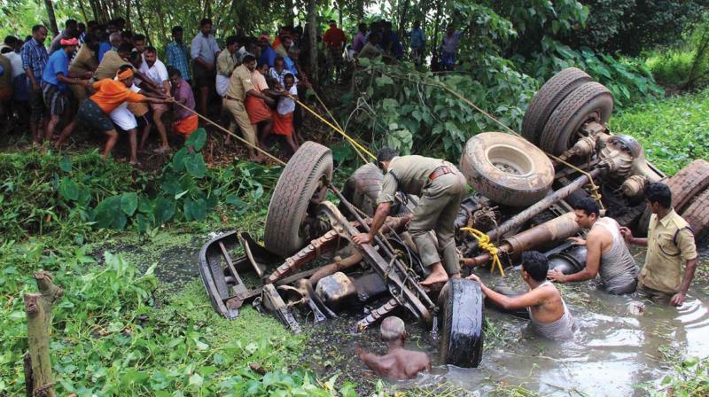 The lorry which fell into a rivulet near Chingavanam near Kottayam on Wednesday. (Photo: BY ARRANGEMENT)