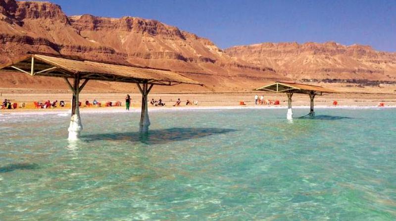 The beauteous Dead Sea with its salt scribbled coast line.