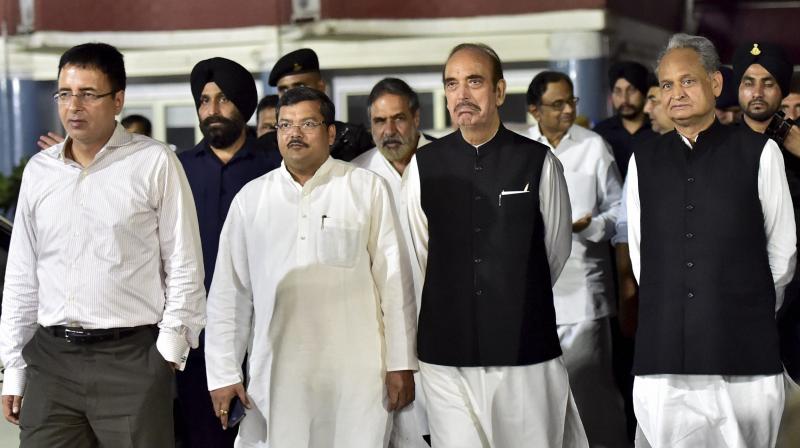 Congress leaders P Chidambaram, Ashok Gehlot, Ghulam Nabi Azad, Mukul Wasnik and Anand Sharma coming out of the Election Commission of India, in New Delhi on Tuesday. A delegation of senior Congress leaders met the election commission over RS polls in Gujarat. (Photo: PTI)