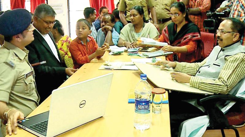 SP Yathish Chandra makes his argument before the SHRC acting chairman P. Mohanadas as seven-year-old Alan contends his statements. (Photo: DC)