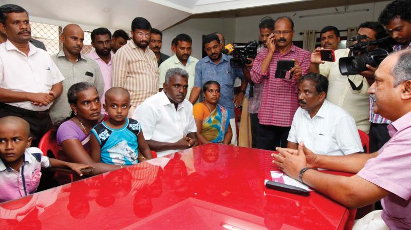 Family of Murukan, who died due to lack of medical care, visits CPM Kollam district secretary K.N. Balagopal on Sunday. (Photo: DC)