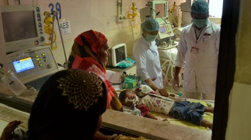 Children receive treatment in the Encephalitis Ward at the Baba Raghav Das Medical College Hospital where over 60 children have died over the past one week, in Gorakhpur district. (Photo: PTI)