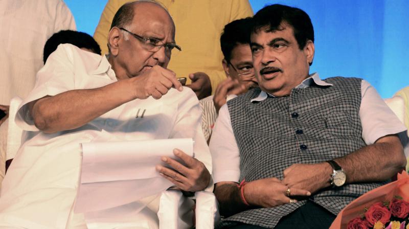 Union Minister for Road Transport and Shipping Nitin Gadkari with NCP chief Sharad Pawar at the foundation stone laying ceremony of a project of National Highways Authority in Pune.