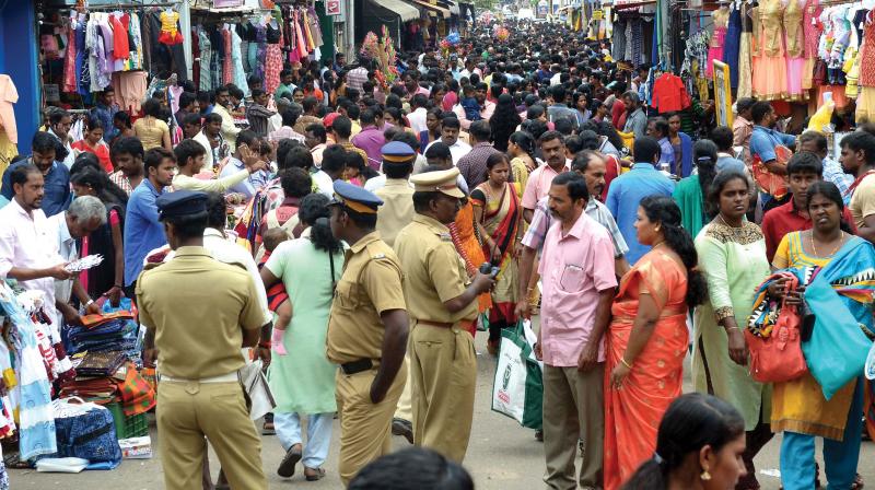 Rush at Pazhavangadi market on Uthradam day on Sunday.