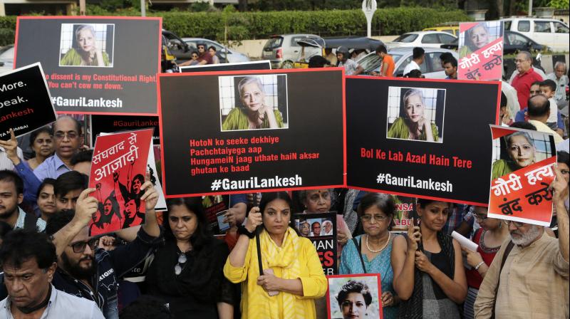 Bollywood actress Shabana Azmi, center, and Nandita Das, second right, participate in a protest condemning the killing of journalist Gauri Lankesh in Mumbai. (Photo: AP)