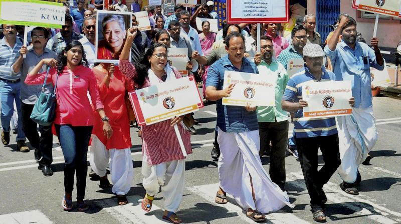 Journalists demonstrate at a protest condemning the killing of journalist Gauri Lankesh, in Thiruvananthapuram on Wednesday. (Photo: PTI)