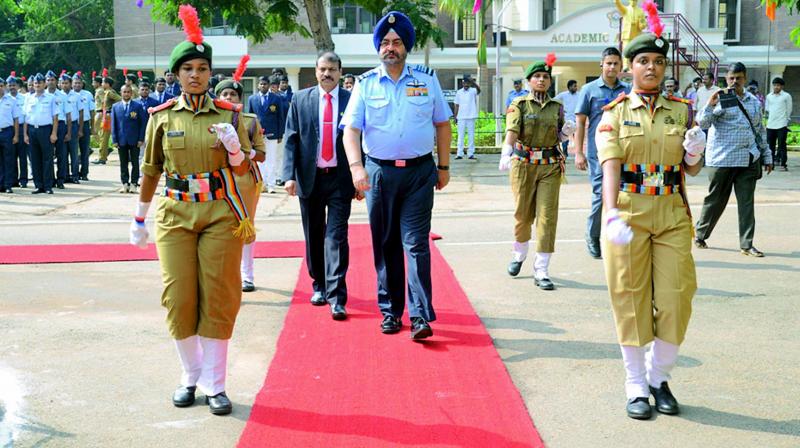 Chief of Air Staff Air Chief Marshal Birender Singh Dhanoa receives a guard of honour by NCC cadets on his arrival at the AU Campus in Visakhapatnam on Friday. (Photo: DC)