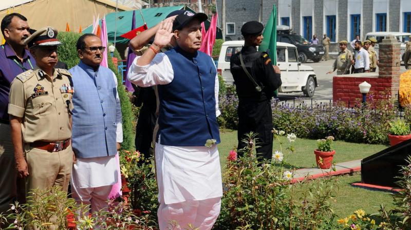 Home Minister Rajnath Singh taking the salute of the Guard of Honour, during his visit to Jammu and Kashmir Police Lines, in Anantnag on Sunday. (Photo: PTI)