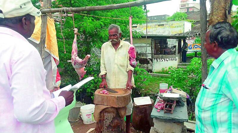 The Guntur public health officials conduct raids on an unofficial and unauthorised meat selling centre in Guntur city on Sunday. (Photo: DC)