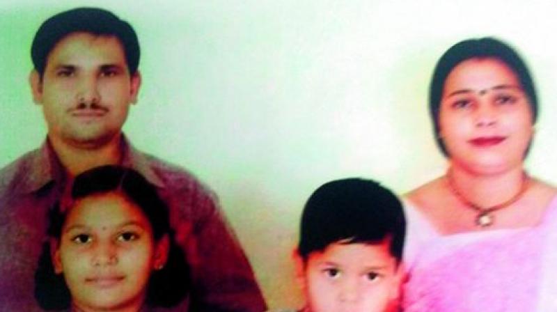 Ayesha Siddiqua (centre) along with her mother Masarath Begum and other family members at her home in Nawab Sahab Kunta in Old City. (Photo: DC)