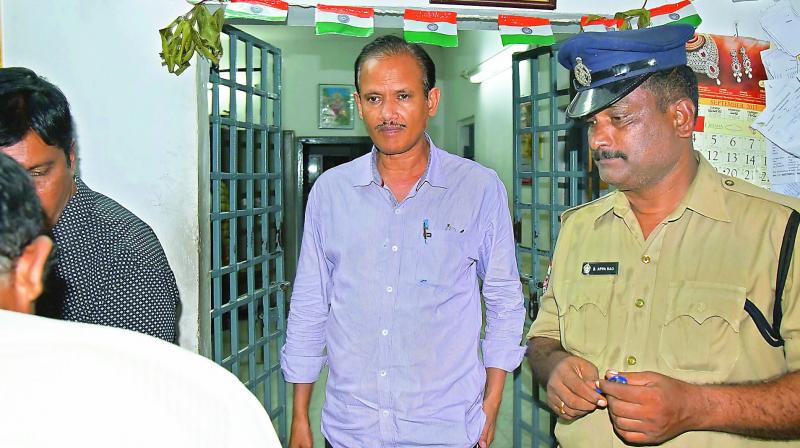 Director of town and country planning G.V. Raghu comes out of three-town police station after facing an inquiry in a ACB case in Vizag on Tuesday. (Photo: DC)