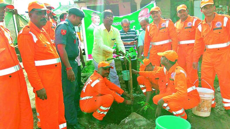 300 NDRF personnel take part in the plantation programme held under Swachhta hi Seva in Mangalagiri.