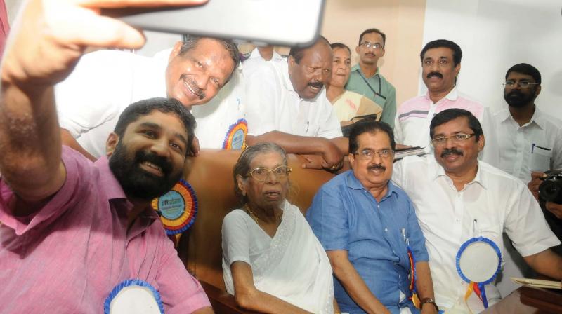 V. T. Balram, MLA, takes a selfie with veteran politician K. R. Gowri and other leaders during the diamond jubilee celebrations of Kerala Assembly in Thiruvananthapuram on Wednesday.  (Photo: A.V. MUZAFAR)