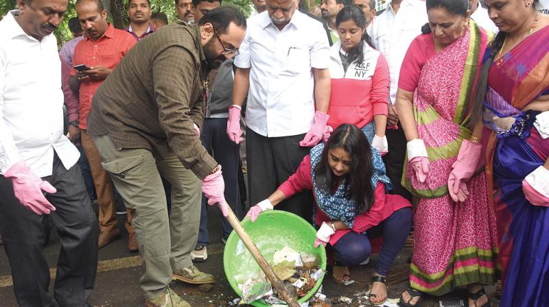 Rajya Sabha member Rajeev Chandrasekhar at a cleaning programme at Rajarajeshwari Nagar. (Photo: DC)