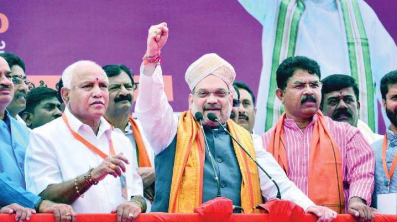 A file photo of BJP president Amit Shah with state unit chief B.S. Yeddyurappa.