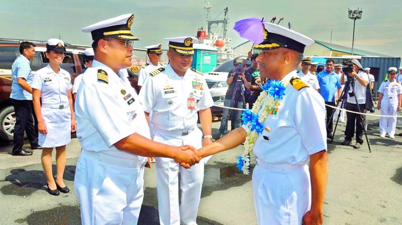 Philippines Naval officials receive officials of  INS Satpura on its arrival at Manila on Tuesday. (Photo: DC)