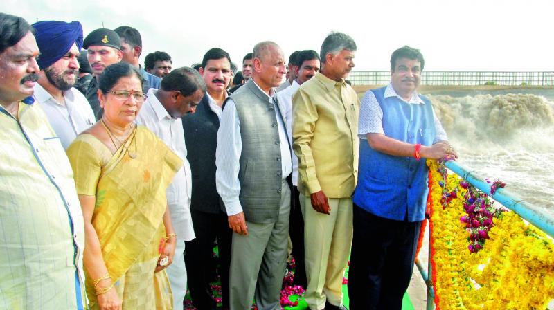 AP and TS Governor E.S.L. Narasimhan, Union minister Nitin Gadkari and AP CM Chandrababu Naidu inspect Polavaram Project in West Godavari on Tuesday. (Photo: DC)