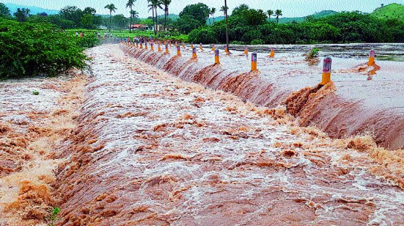 Chitravathi river over flows at Puttaparthi after a decade. (Photo: DC)