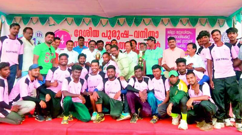 Softball team are all smiles as they pose with the trophy at the 14th Senior South Zone National Softball Championship for men & women at the Pathanamthitta Municipal Stadium in Kerala.