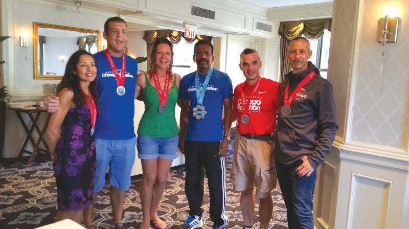 Ashok with fellow UK runners who received the Chicago medal.