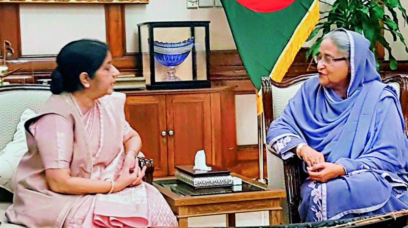 External affairs minister Sushma Swaraj with Bangladesh Prime Minister Sheikh in Dhaka on Sunday. (Photo: PTI)