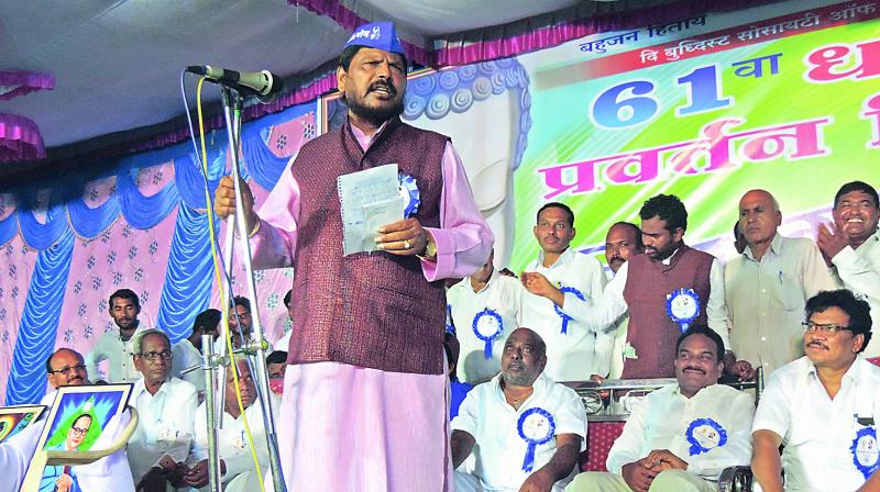 Union minister of state Ramdas Athawale speaks at 61st Dharma Chakra Parivarthan Diwas celebrations in Adilabad town on Sunday. Minister for forest Jogu Ramanna and Adilabad MP Godam Nagesh also seen. (Photo: DC)