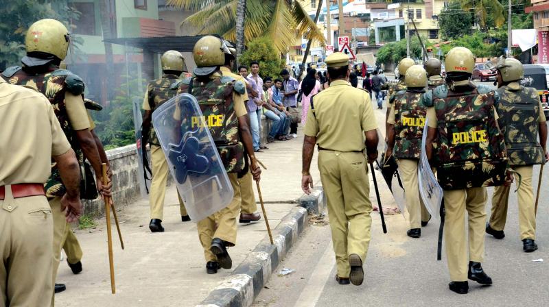 Police disperse away the students who stood on MC road followed by the student attacks at MG college. (file pic).