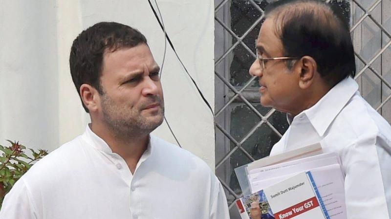 Congress Vice President Rahul Gandhi talks to senior leader P Chidambaram after holding a meeting with the partys general secretaries at AICC headquarters in New Delhi. (Photo: PTI)