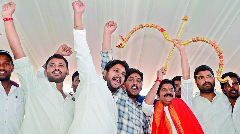 A. Revanth Reddy with his supporters at his residence in Hyderabad on Monday. (Photo: DC)