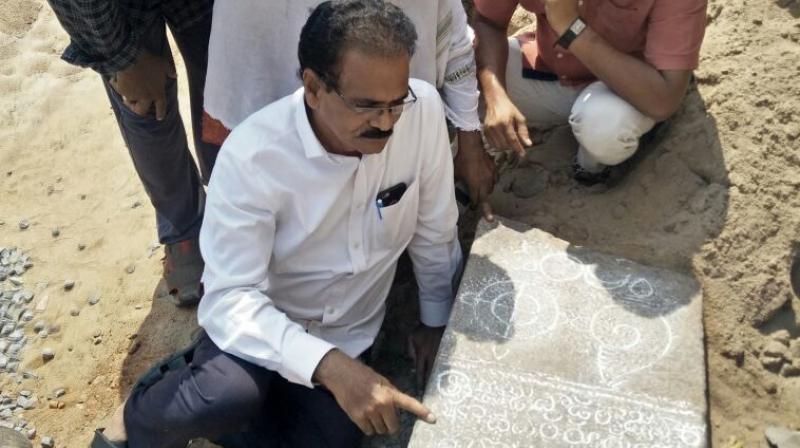 E. Sivanagi Reddy and others found 15th century inscription of the Gajapati King Kumara Hamvira at Enikepadu village near Vijayawada on Tuesday.