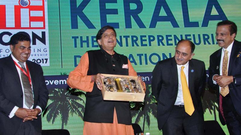 TiE Kerala president Rajesh Nair, Shashi Tharoor, MP, Federal Bank CEO Shyam Srinivasan and Aster DM Healthcare Chairman Azad Moopan at the inauguration of TiE-con Kerala 2017 in Kochi on Friday.  (Photo: SUNOJ NINAN MATHEW)