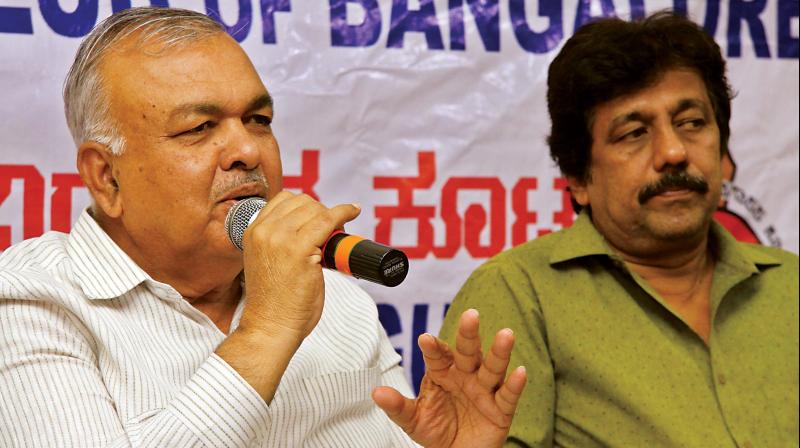 Home Minister Ramalinga Reddy seen addressing the Meet the Press program at Press Club. Also seen Sadashiv Shenoy, President Press Club of Bangalore, in Bengaluru on Saturday. (Photo: DC)