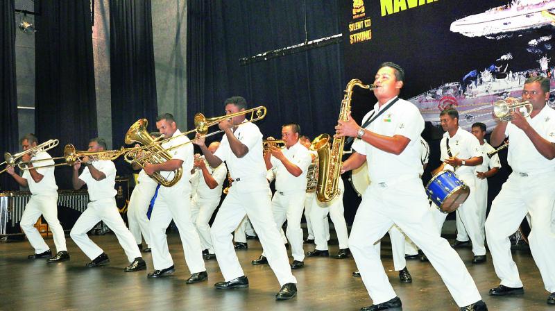 Navy personnel enthrall the public with their band performance on the occasion of Childrens Day celebrations at VUDA Childrens Arena in Visakhapatnam on Tuesday.  (Photo: DC)