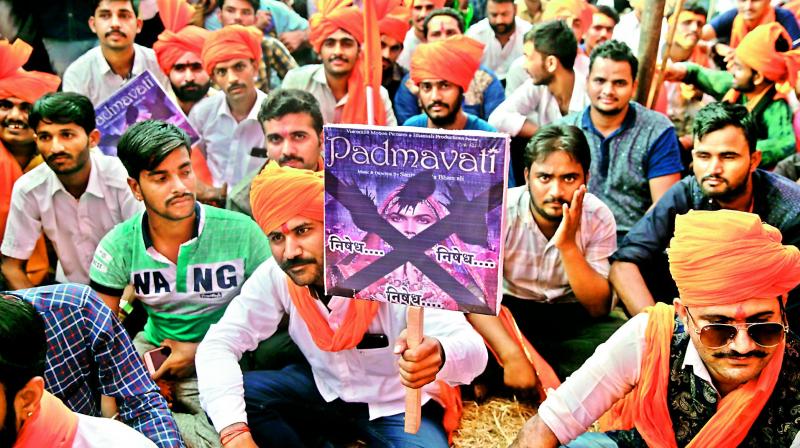 Rajputs hold placards as they protest against the release of film Padmavati in Mumbai on Monday.  (Photo: AP)