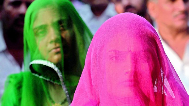 Rajput women listen to a speech as they gather to protest against the release of Padmavati in Mumbai on Monday. (Photo: AP)