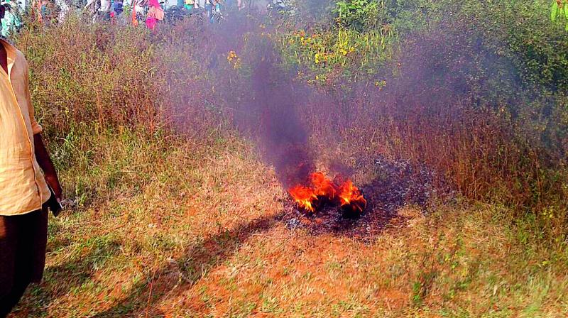 Fire erupts after the Kiran trainer aircraft of the IAF crashed on Friday after taking off from Hakimpet.